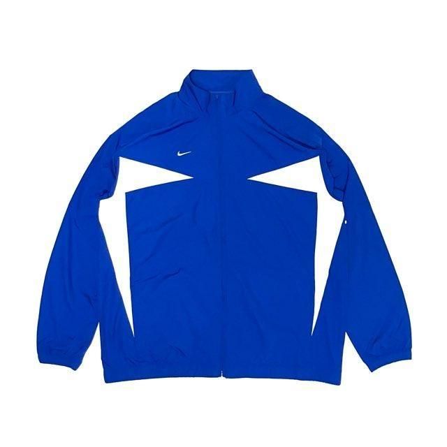 <div>Nike</div>2000s DEADSTOCK<br>NYLON WINDBREAKER<br>BLUxWHT