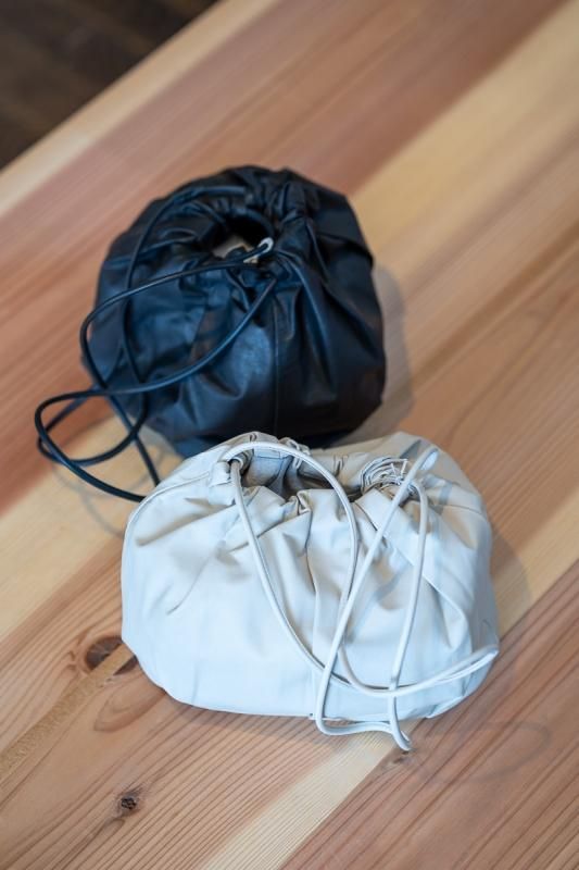 evam eva drawstring mini bag