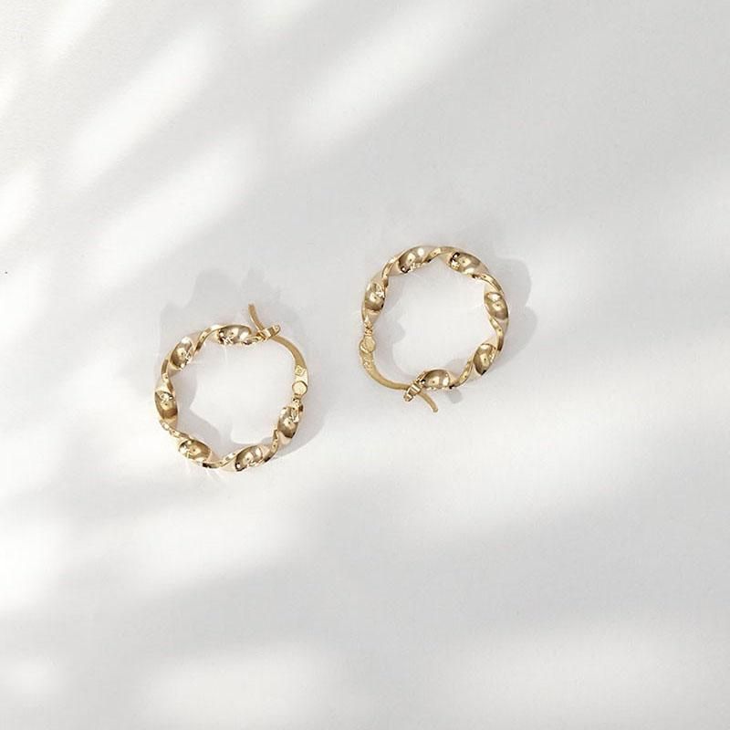 LOUISE DAMAS ツイストデザイン フープピアス 24K