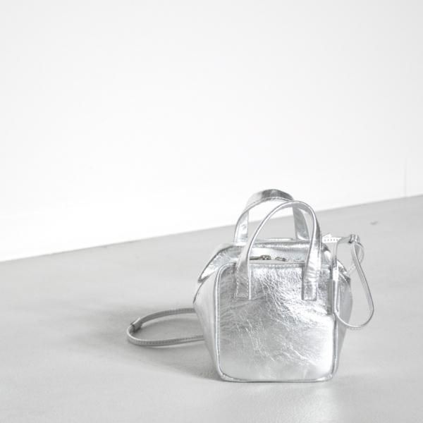 M.LEATHER DEFORMATION DICE BAG