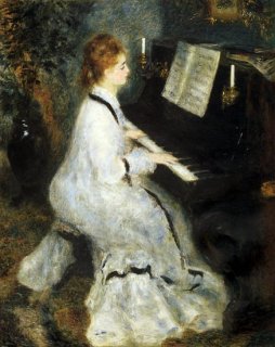 ピアノを弾く若い女