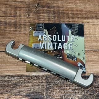 šCreamTone / Aged Aluminum Tailpiece Nickel