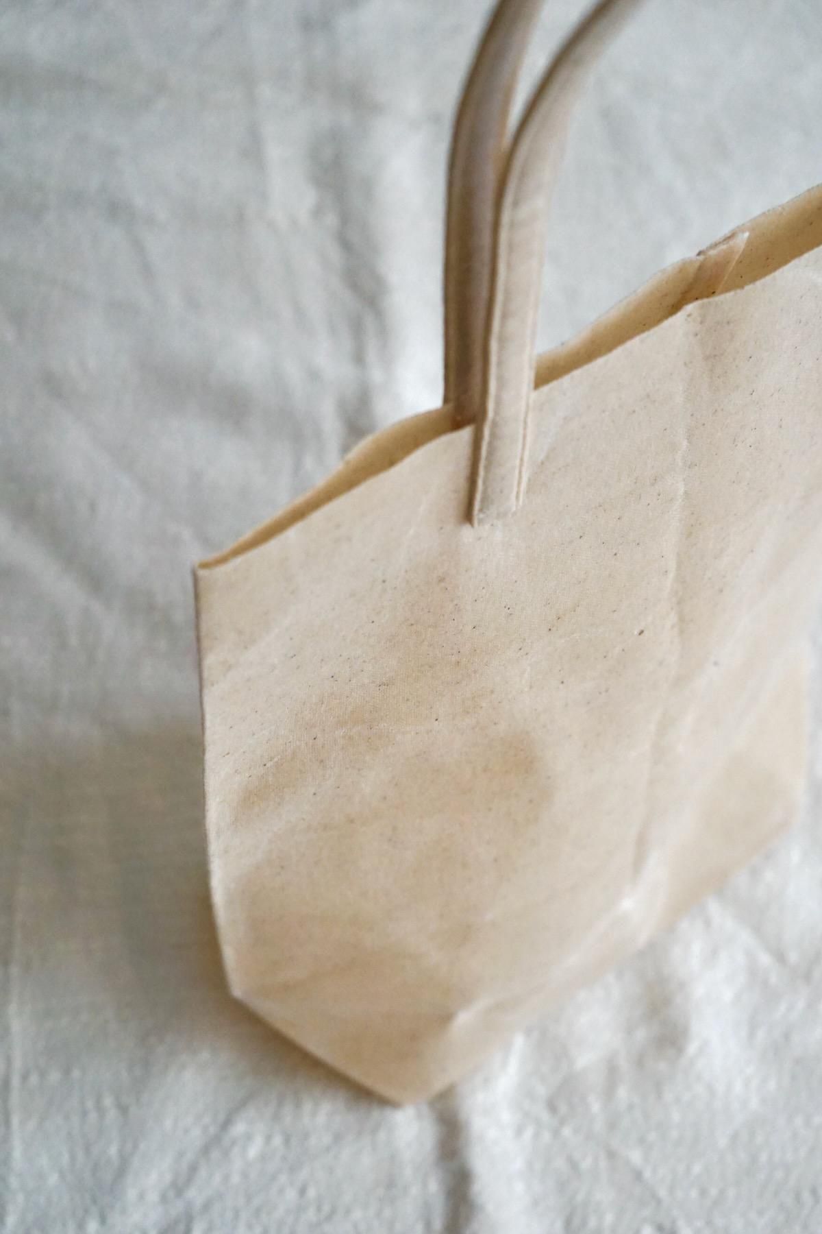 KAZUMI TAKIGAWA / カズミタキガワ / FUNAGATA BAG M(L) 【Nid