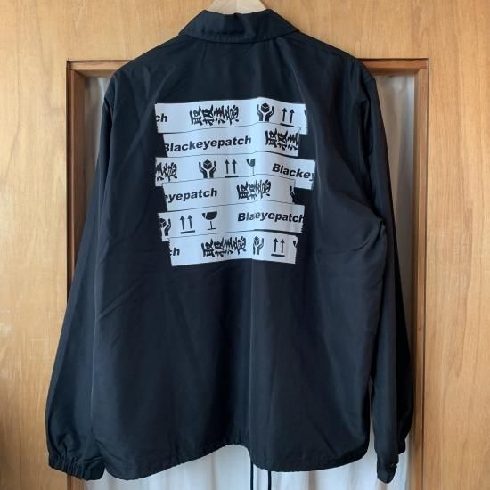 Black Eye Patch Handle With Care Coach Jacket - New York Storage