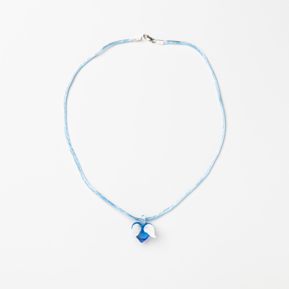 Glass blue angel heart on cord