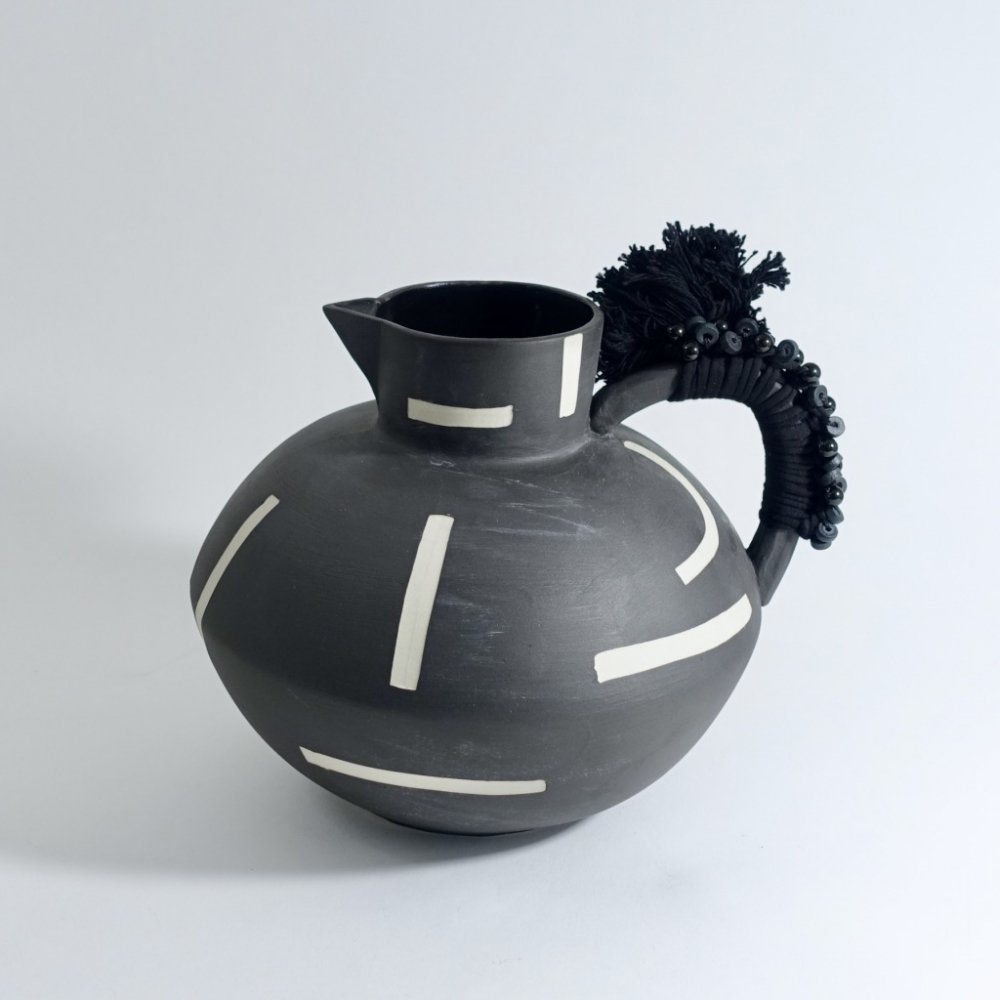 black round jug