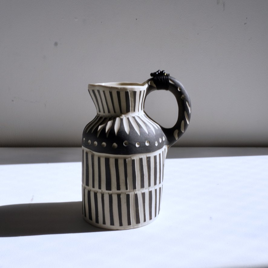 black little jug