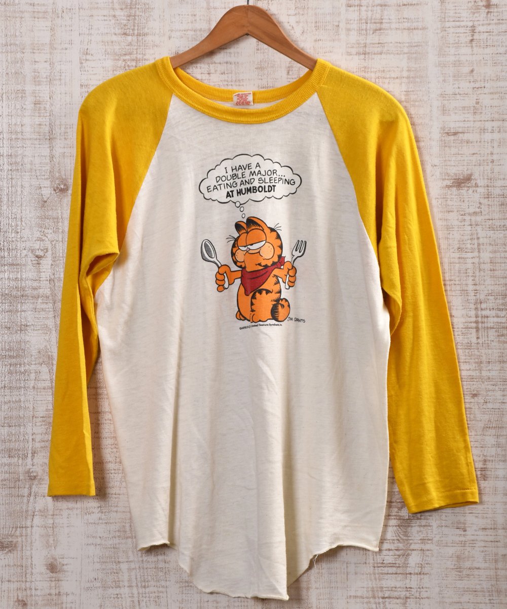 GARFIELD illustration Print Raglan Sleeve T Shirt Made in USA  ｜「ガーフィールド」イラスト ラグランスリーブTシャツ アメリカ製 - 古着のネット通販サイト 古着屋グレープフルーツ  ムーン(Grapefruitmoon)Onlineshop ヴィンテージアイテム・レトロファッション