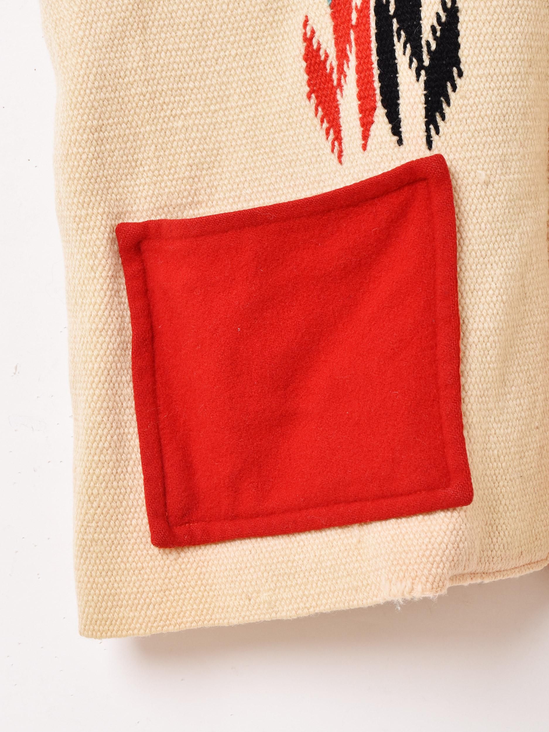 KNIT BLANKET VEST