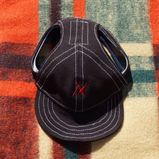 1 logo capåBLACK