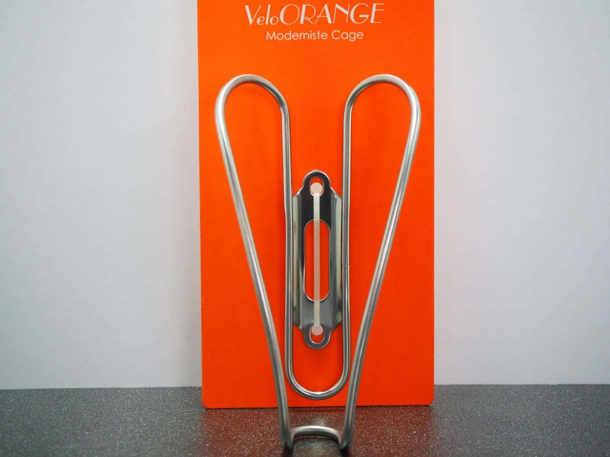 <img class='new_mark_img1' src='https://img.shop-pro.jp/img/new/icons13.gif' style='border:none;display:inline;margin:0px;padding:0px;width:auto;' />Velo Orange Moderniste Stainless Steel Bottle Cage